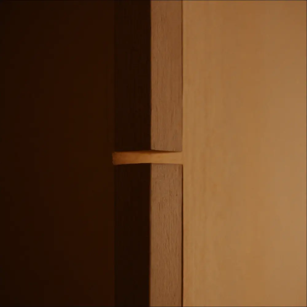 A precise oiled blackbutt timber corner joint